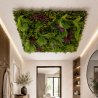 Module de feuillage artificiel pour plafond avec fougères, lierres, herbes longues et touches florales.